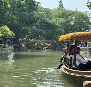 May be an image of 2 people and boat
