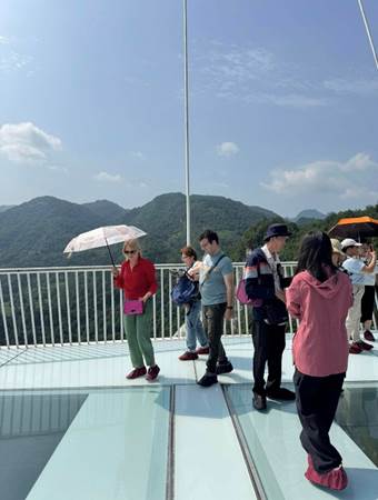 May be an image of 6 people, cable car and Victoria Peak